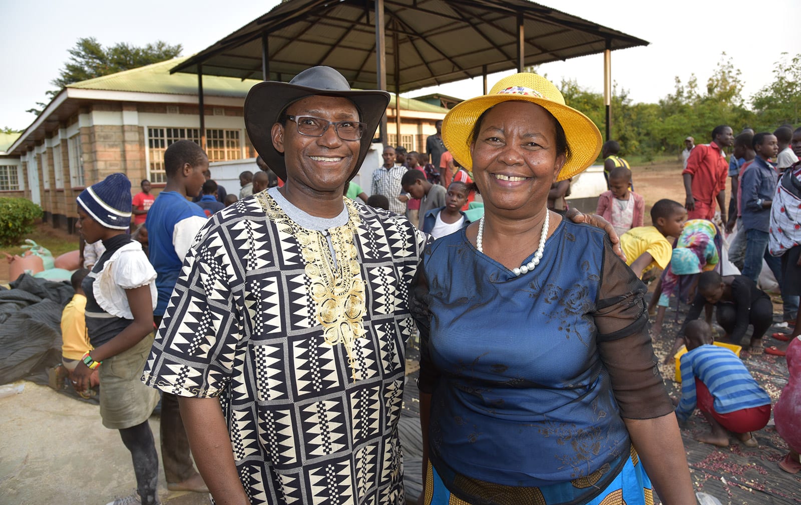 about-charles Charles Mulli and Esther Mulli volunteering