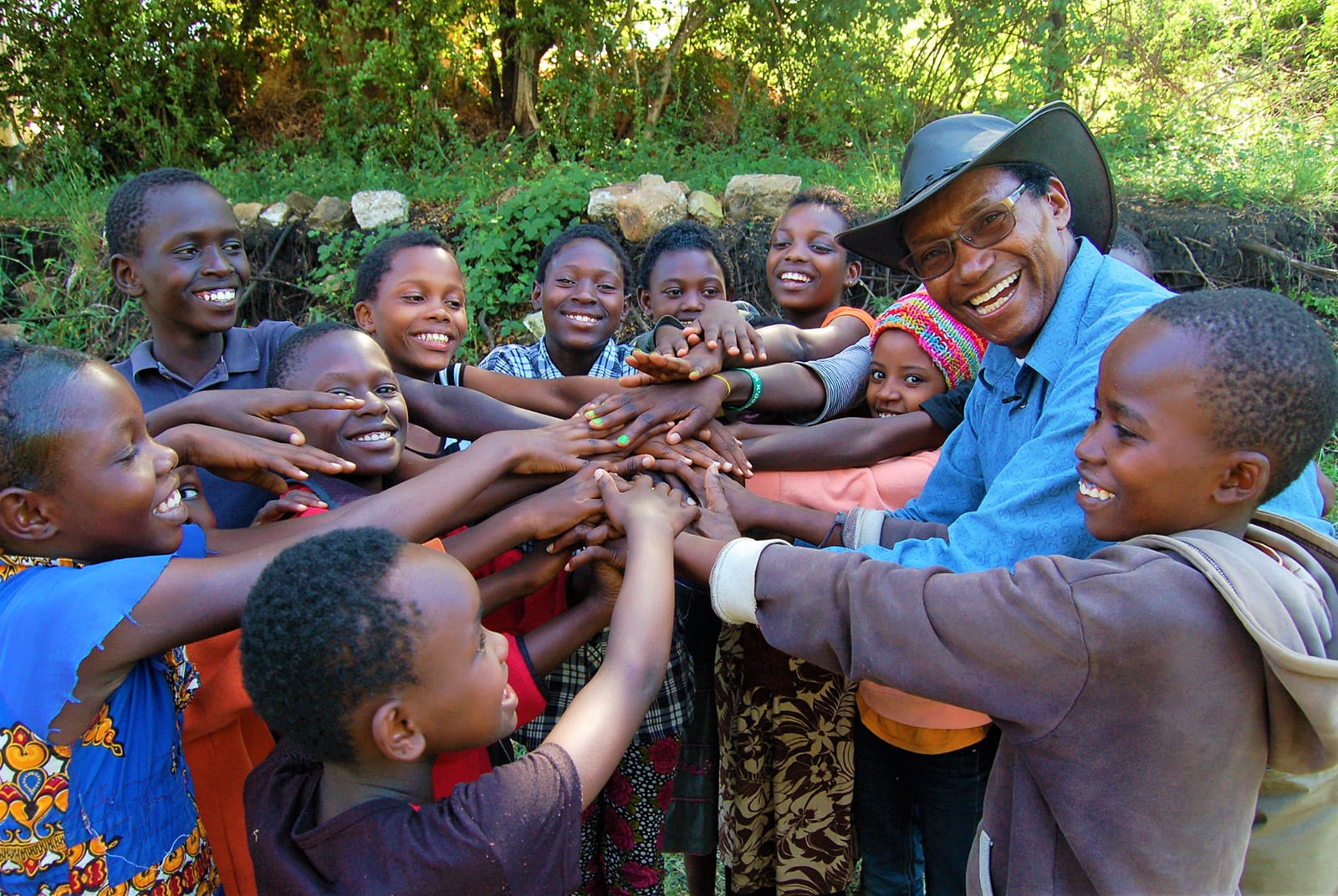 Charles Mulli with Mully Children in a circle