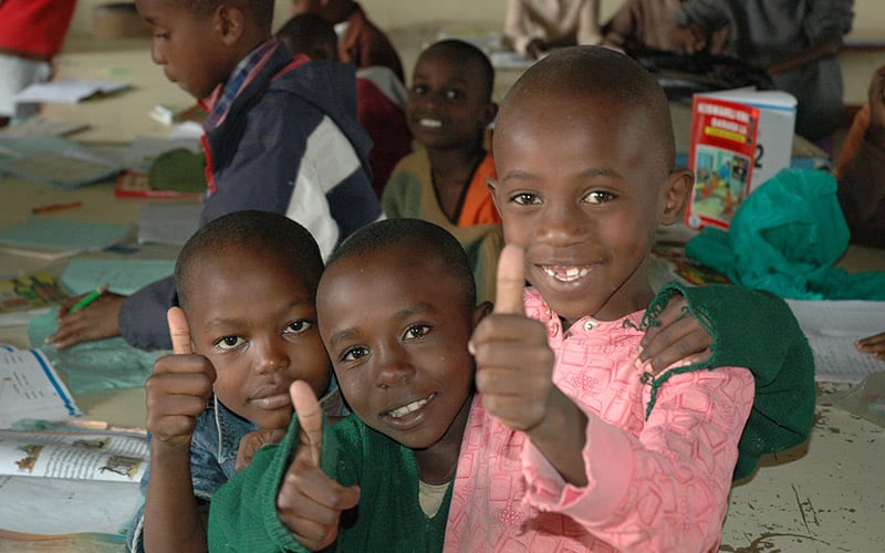 Mully Children giving thumbs up