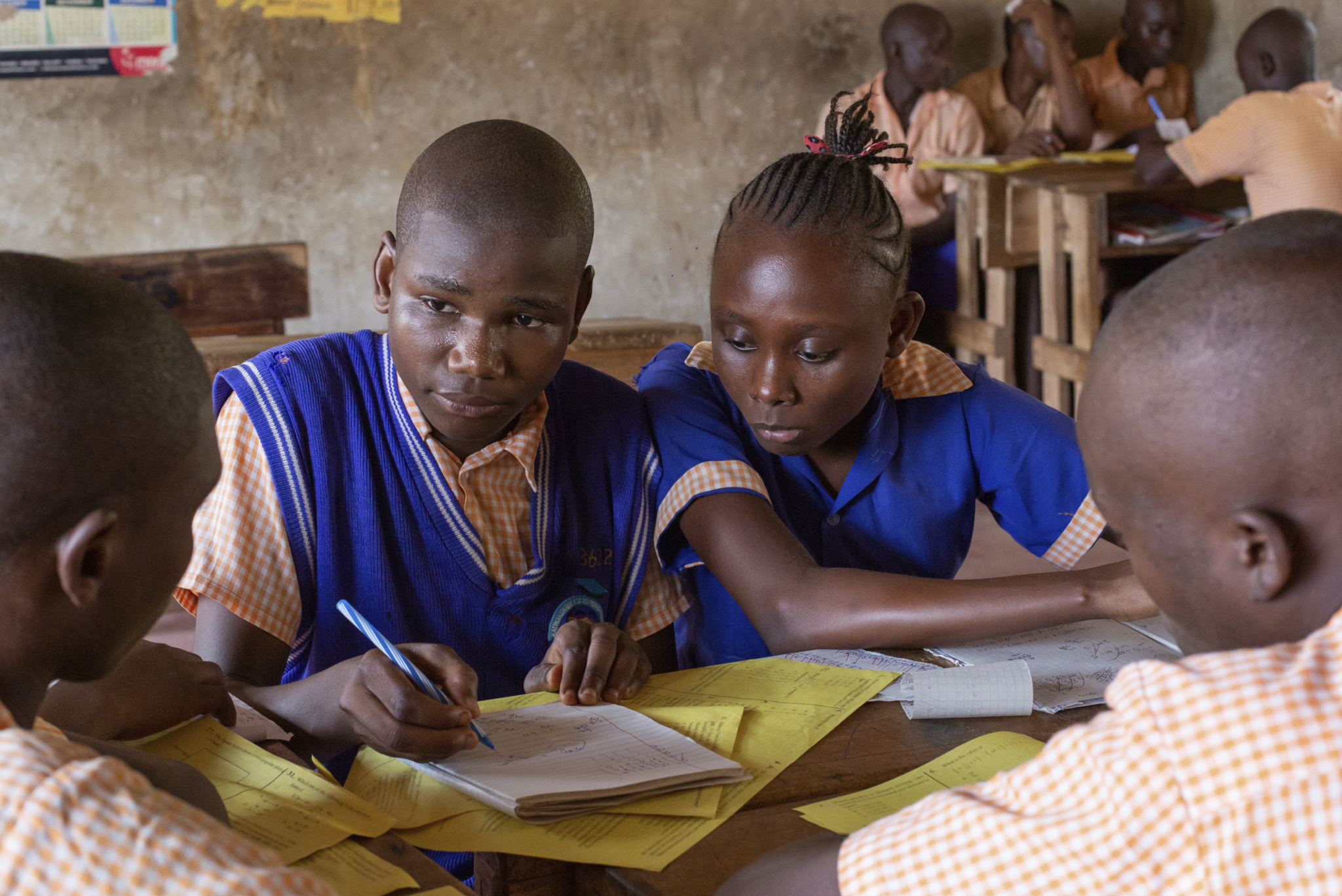 Students in classroom uniforms